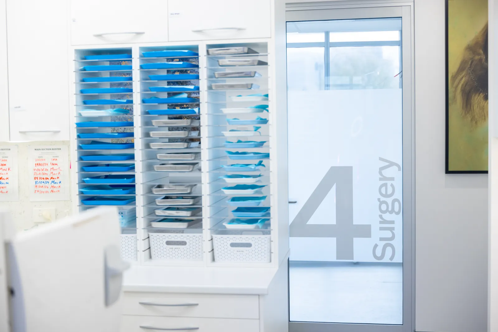 Prepared instrument trays outside a surgery room at Infinity Dental Care